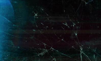 Shattered background. Defocused broken glass. Blur dark frozen distressed dirty tablet display with...