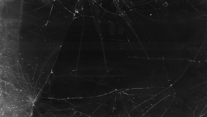 Cracked overlay. Broken glass texture. Black smashed distressed tablet screen with dust scratches...