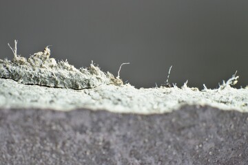 Detailed photography of roof covering material with asbestos fibres. Health harmful and hazards effects.