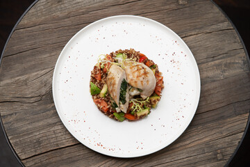 Baked chicken breast with quinoa rice. Healthy food