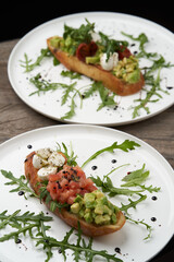 Healthy vegetarian bruschetta with vegetable and cheese.