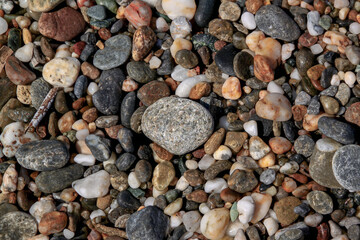 Pebbles and rocks on the beach of the Mediterranean Sea in Israel