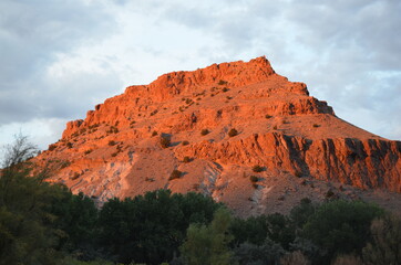 Sunset on red rock hill