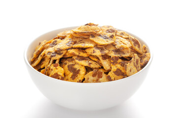 Spicy Chana Jor Garam in a white ceramic bowl, made with air-fried Bengal Chickpea. Pile of Indian spicy snacks (Namkeen), under backlight, side view, against the white background.