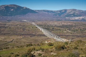 Naklejka premium Views of the High-speed railway Madrid-Segovia-Valladolid from the Saint Peter Peak, in the municipality of Colmenar Viejo, Madrid, Spain
