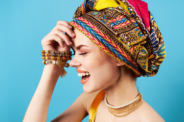 pretty woman turban on her head decoration phone blue background