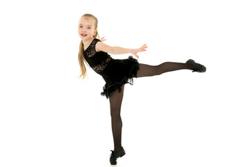 Obraz premium Cute little girl in a dance suit, on a white background.