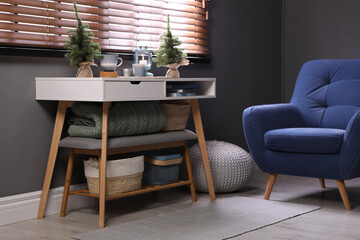 Modern room interior with table near window