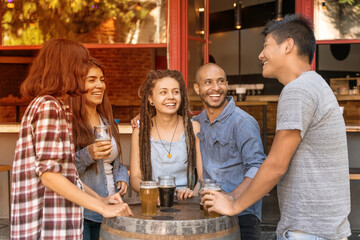 A group of friends having fun in a beergarden