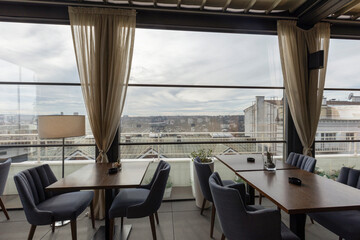 Interior of an empty restaurant with a view