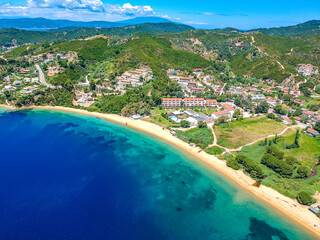 Aerial view over southern skiathos island, Greece with modern hotels and luxurious villas in Sporades, Greece,