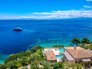 Fototapeta na wymiar Aerial view over southern skiathos island, Greece with modern hotels and luxurious villas in Sporades, Greece,