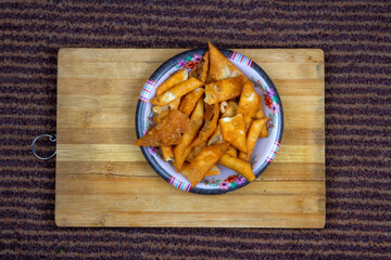 Top shot of a plate with spicy crispy salty chips