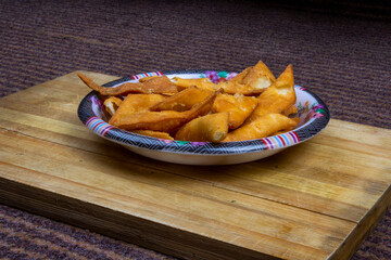 Full corner shot of a plate with spicy crispy salty chips