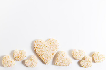 a heart shape cutted out of wholewheat bread
