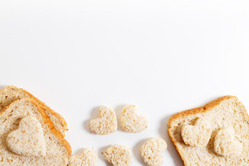 a heart shape cutted out of wholewheat bread