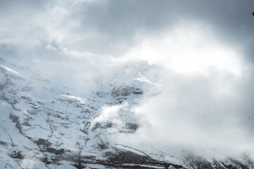 clouds at lake Oeschinensee on a cloudy autumn day