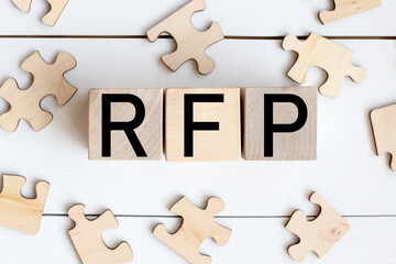 Obraz premium RFP word on wooden blocks, white background, business concept. business and finance