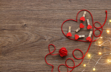 Valentine's day red thread hearts. Small hearts inside the heart. Valentine's Day holiday background with hearts. beautiful heart. A holiday of love. with place for text. bokeh. Wedding concept