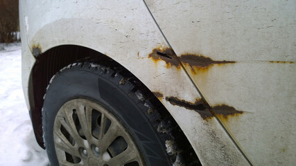 Sheet metal corrosion and scratches car body. Rusty steel surface, background and damaged texture....