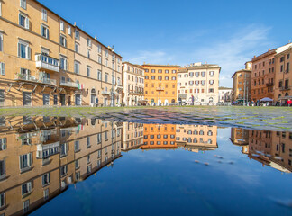 
Rome, Italy - in Winter time, frequent rain showers create pools in which the wonderful Old Town...