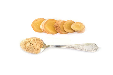 Fresh ginger root and ginger powder in spoon isolated on white background