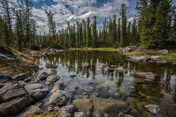 Small beautiful lake in the natural park Ergaki.