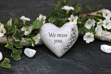Heart with the inscription We miss you