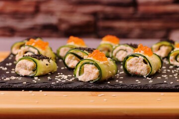 Cucumber rolls, vegetarian food, delicious and healthy breakfast