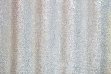 Background slate asbestos. Grey, fluted. View from the front.