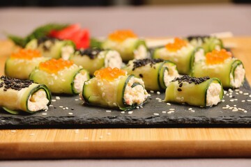 Cucumber rolls, vegetarian food, delicious and healthy breakfast