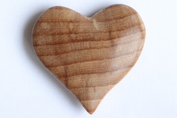 Valentine's day, wooden heart on a light background.