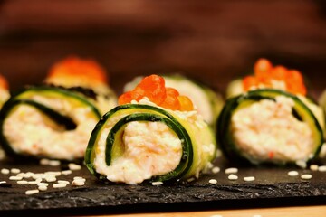 Cucumber rolls, vegetarian food, delicious and healthy breakfast