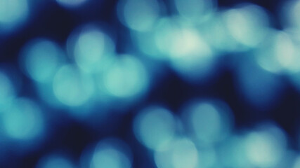 Fototapeta premium Blurred white Bokeh of light on black background in vintage tone. Green lighting blurry wallpaper. 