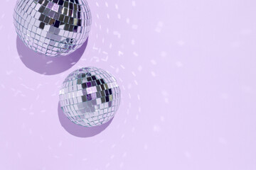 beautiful disco balls on pink background isolated.