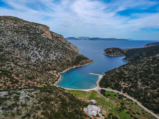 Aerial panoramic view of the picturesque old harbor Gerakas in northern Alonnisos, Greece. Beautiful scenery with rocky formation and natural fjord-like bay in Sporades Aegean sea, Greece