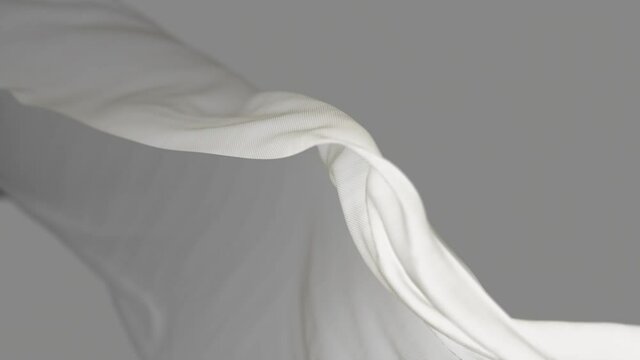 4k White wave satin fabric loop background.Wavy silk cloth fluttering in the wind.tenderness and airiness.3D digital animation of seamless flag waving ribbon streamer riband.
