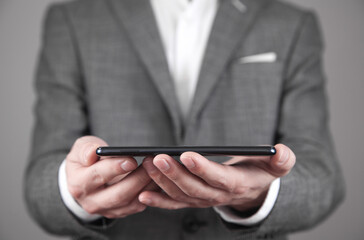 Man holding smartphone. Technology concept