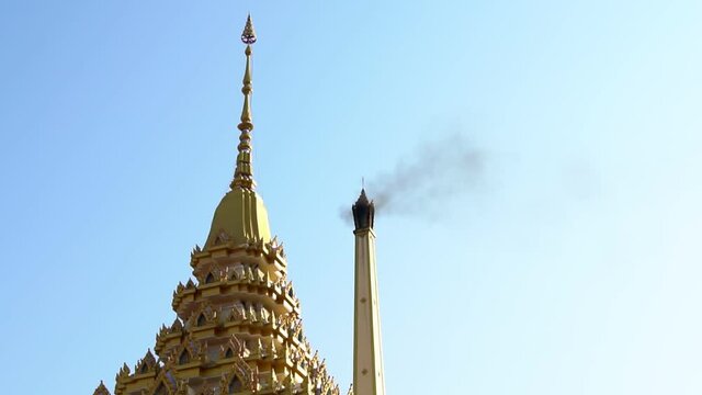 loseup of Crematoriums in Used with Smoke Against Blue Sky,Last Funeral pyre Crematory Crematorium Cremate.	