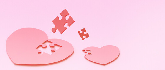 Jigsaw Red Heart Lost and Happy Valentine in Love Concept on Pink Background.digital banner art,Copy Space - 3d rendering