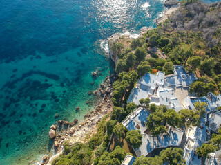 Deserted beach and modern resorts over Marpounda beach in Alonnisos island due to the measures against coronavirus pandemic disease in Sporades, Greece