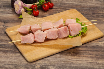 Raw pork meat skewer for grill