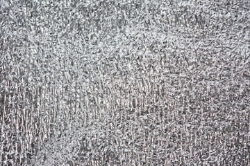 texture of insulating and warming foil and neoprene material