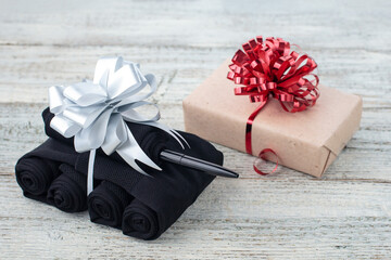 Handmade tanks of socks as gift to men on February 23. And box with red bow