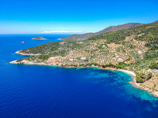 Aerial drone view over Chrisi Milia beach and the rocky surrounded area in Alonnisos island, Sporades, Greece