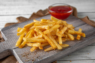 French fries. Golden, delicious, crispy and hearty. Fast food.