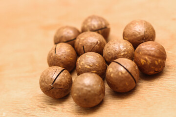 Healthy, organic inshell macadamia nuts. An expensive nut for the keto diet.