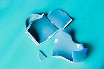 Broken cup to pieces. Smash ceramic dishes
