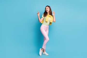 Fototapeta na wymiar Full length body size view of lovely carefree cheerful girl dancing having fun chill isolated over bright blue color background