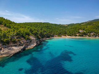 Fototapeta na wymiar Aerial drone view over Chrisi Milia beach and the rocky surrounded area in Alonnisos island, Sporades, Greece